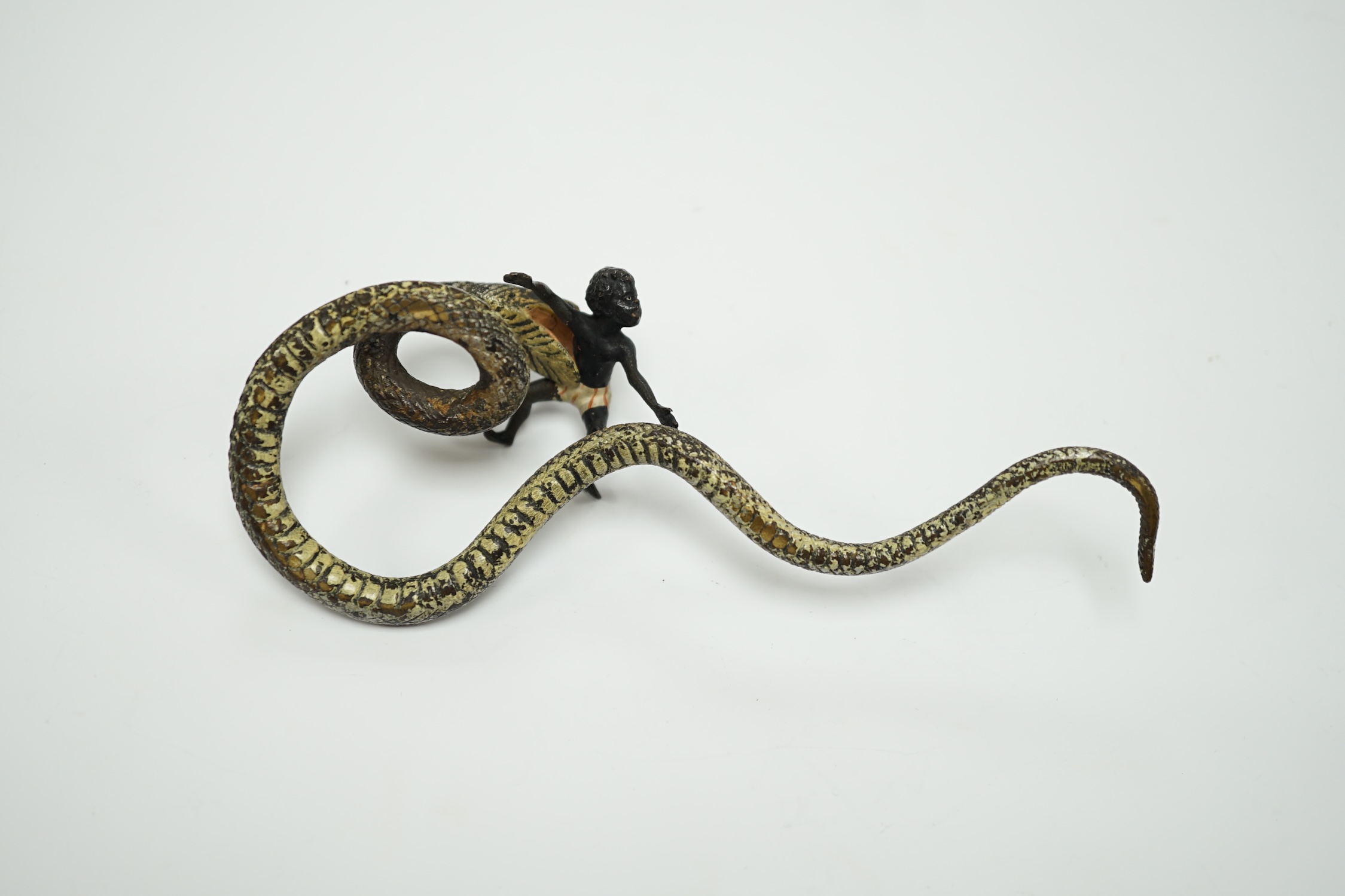 A Viennese cold painted bronze snake devouring a man, 14cm long